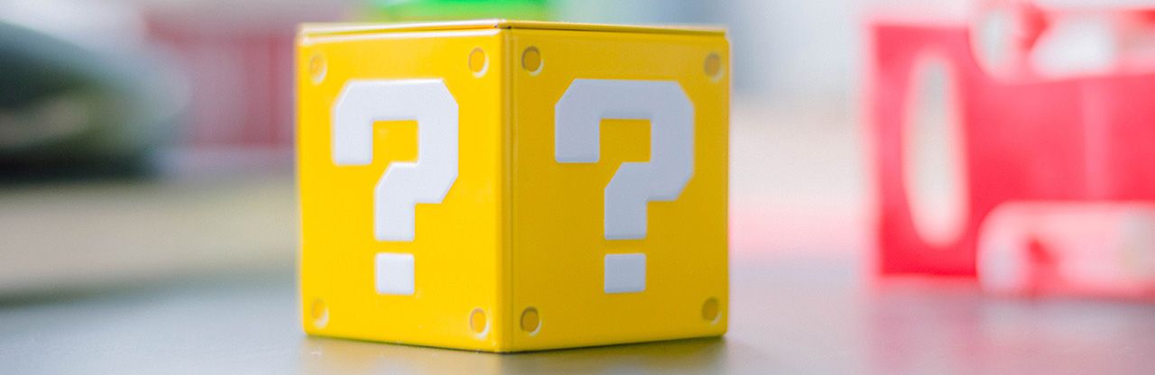 question mark on yellow toy block